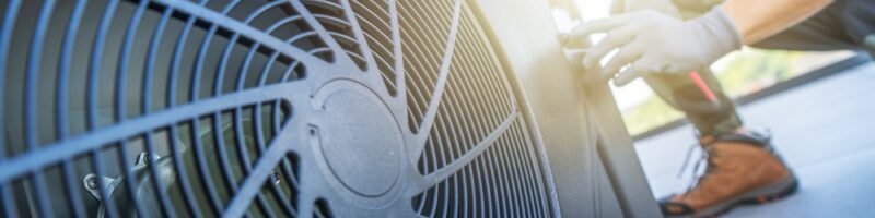 A,Technician,Is,Performing,Maintenance,On,An,Air,Conditioning,Unit